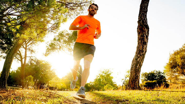 How Muscle Cramps Cramped My Running Style Man runing in the park